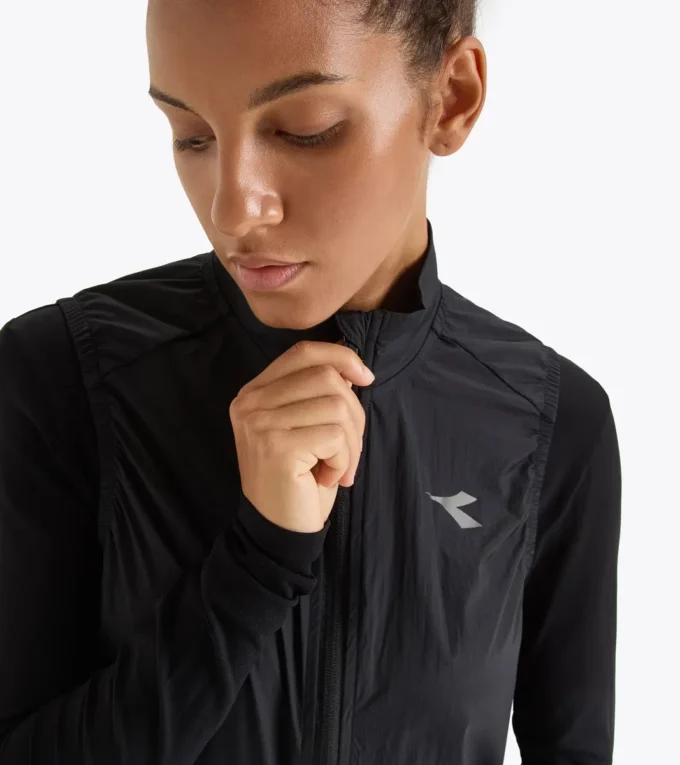 L. Gilet compact Gilet de course compact et coupe-vent