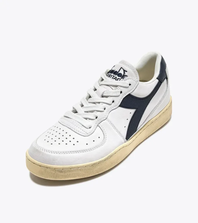 Mi Basket Low Used Heritage baskets en cuir Mi Basket Low Used Heritage baskets en cuir