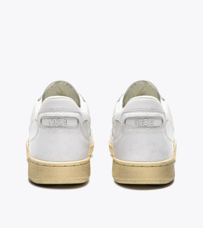 Mi Basket Low Used Heritage baskets en cuir Mi Basket Low Used Heritage baskets en cuir