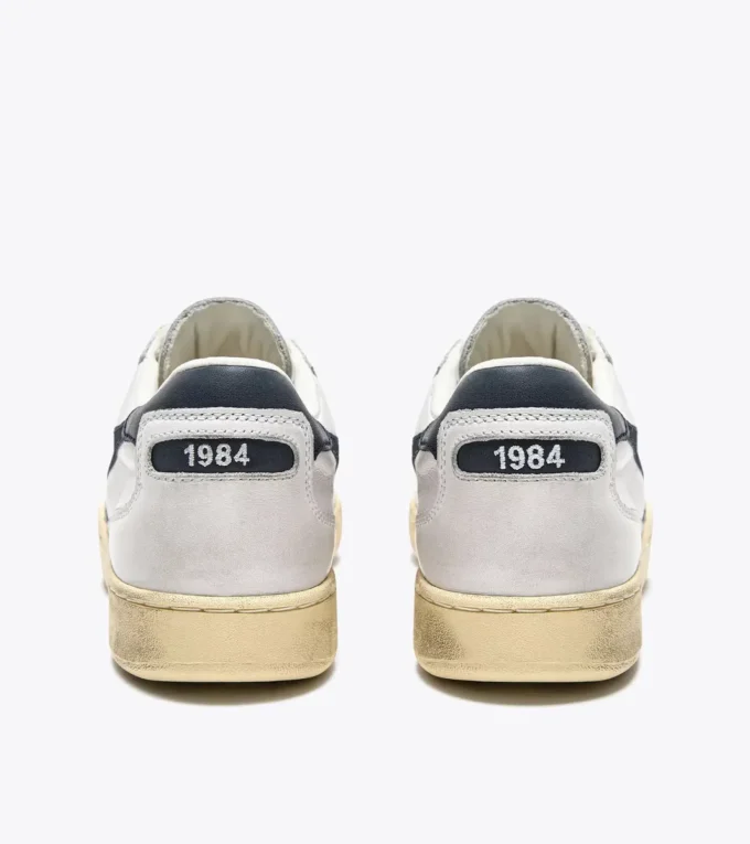 Mi Basket Low Used Heritage baskets en cuir Mi Basket Low Used Heritage baskets en cuir