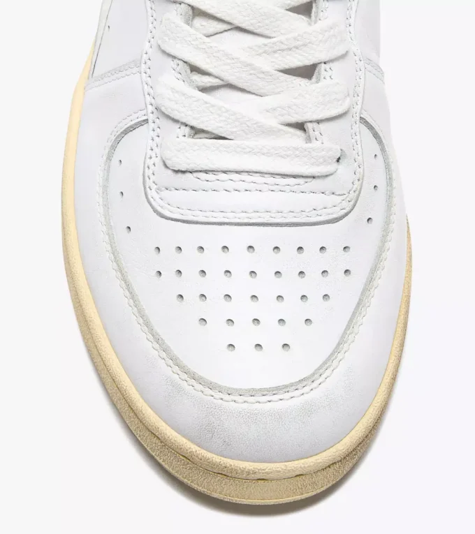 Mi Basket Low Used Heritage baskets en cuir Mi Basket Low Used Heritage baskets en cuir