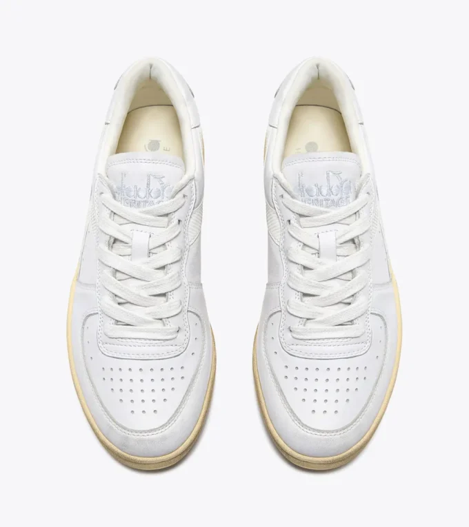 Mi Basket Low Used Heritage baskets en cuir Mi Basket Low Used Heritage baskets en cuir